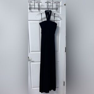 BCBG black gauze fabric halter tie long evening gown.  Worn one time.  Size 8